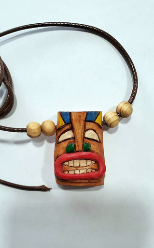 hand carved tiki pendant